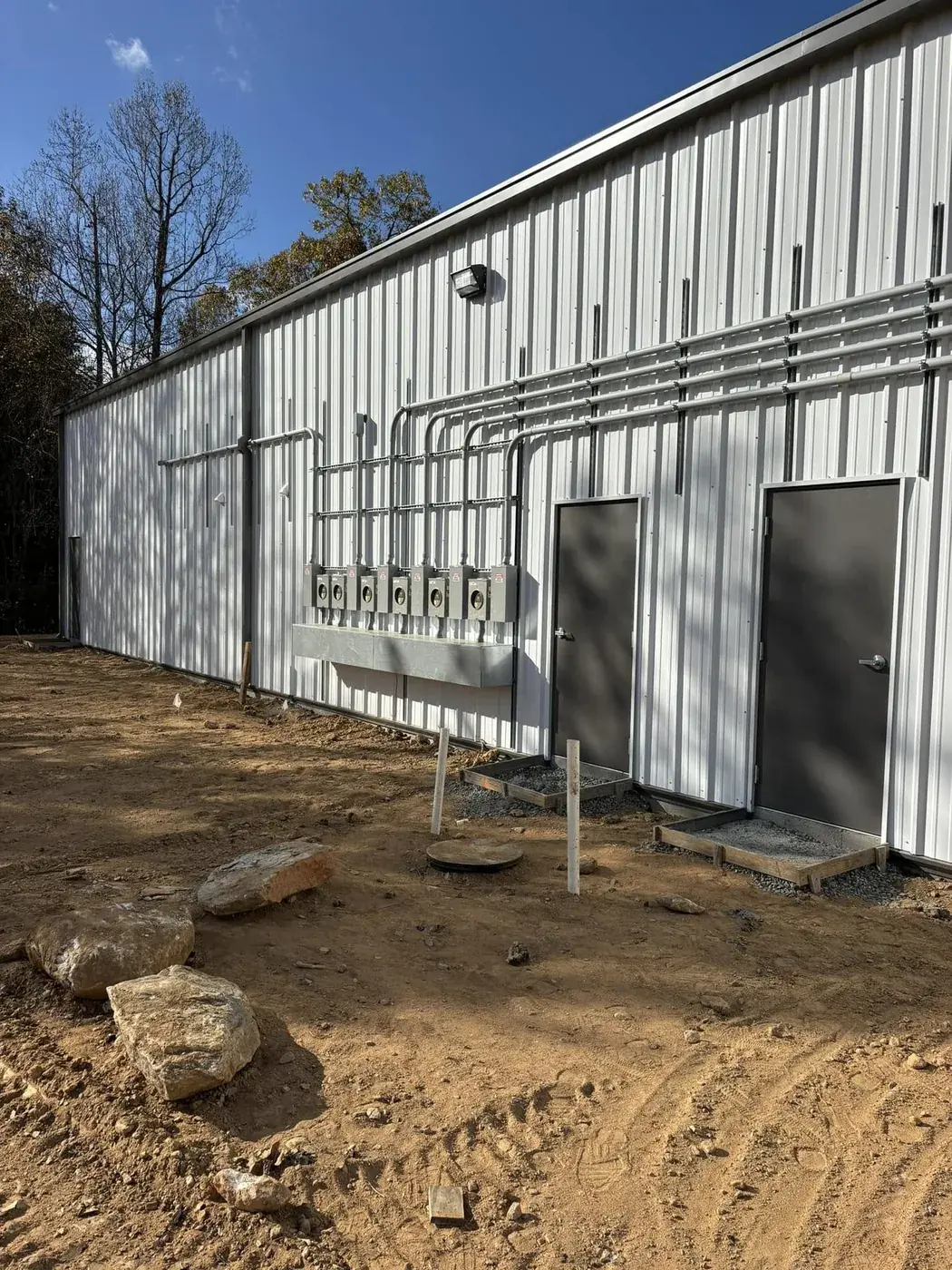 Commercial meter bank and conduit runs installed by Amplified Electric