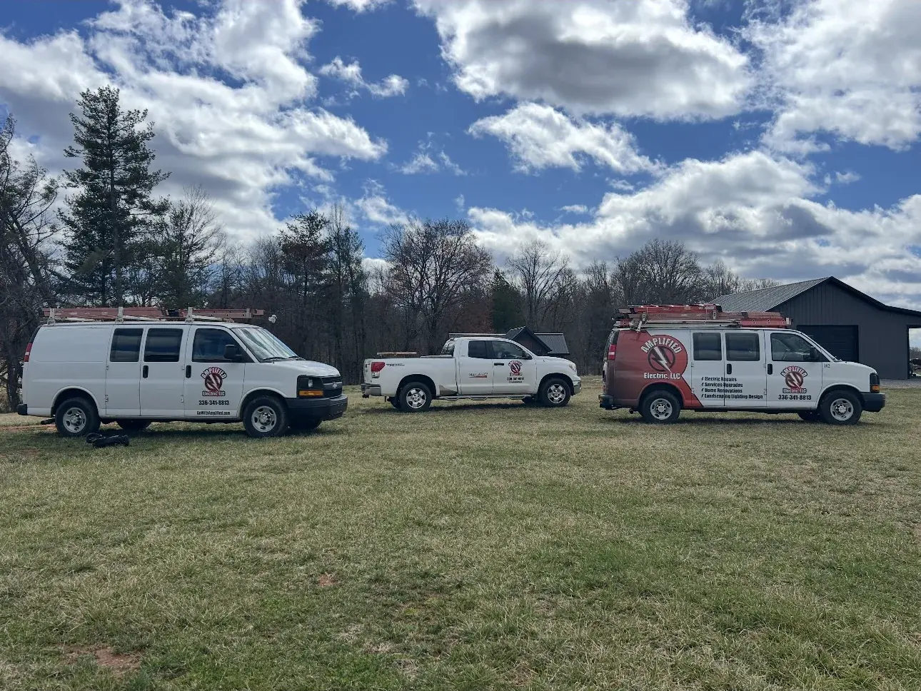 The Amplified Electric fleet of three trucks